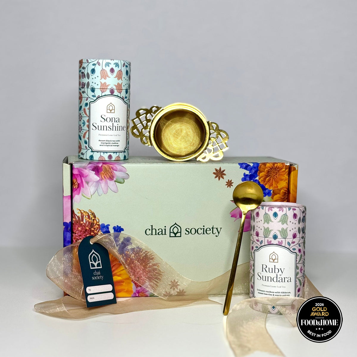 A hand-crafted Chai Society tea gift box presented for Christmas gifting, ready to give with no wrapping required