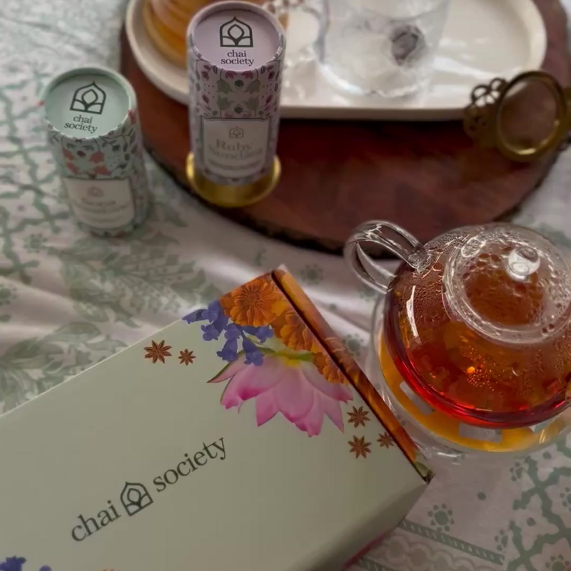 luxury tea gift set presentation with original art packaging